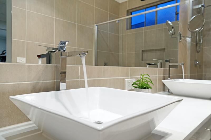 square-vessel-sink-with-running-chrome-tap